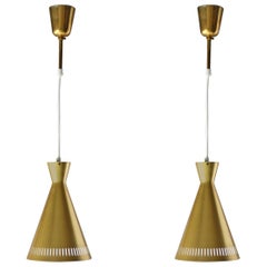 Pair of Brass Scandinavian Diabolo Pendants