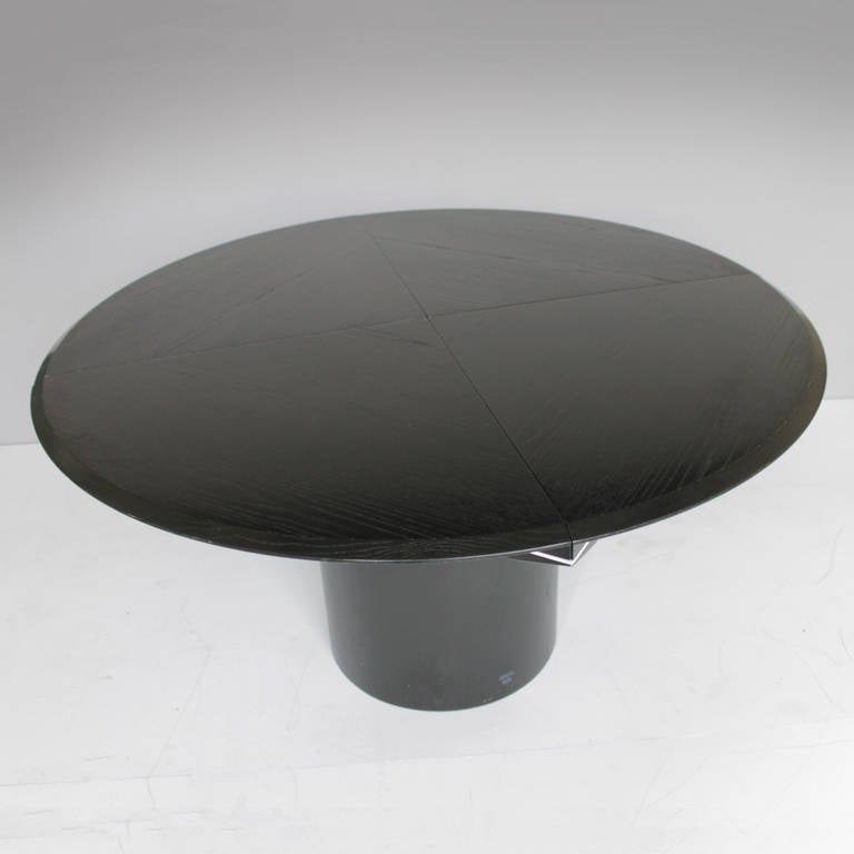 Dining table 'Quadrondo' by Erwin Nagel for Rosenthal. A folding table, from round to square, in a optic graphic black and white design. Diameter: 55.12 inches (140 cm). Height: 26.6/28.7 inches (67,5/73 cm).
