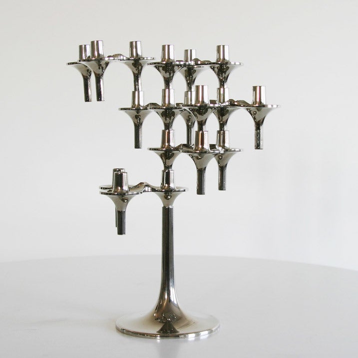 Candlestick System from (West-) Germany. Design: Ceasar Stoffi en Fritz Nagel. Manufacturer BMF (Bayerische Metall Fabrik). Chrome. Six parts on a foot. In many ways stackable.