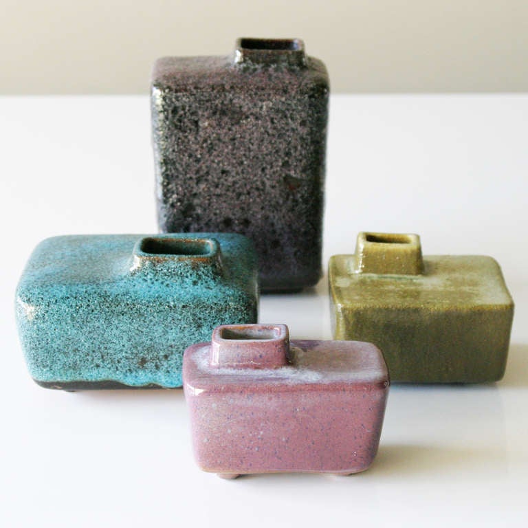 Set of four Ikebana or Chimney vases by Dutch ceramist Pieter Groeneveldt. 
Measurements green vase: depth 3.7 in., length 4.3 in., height 3.1 inches (9,5 x 11 x 8 cm), blue 5.9 x 5.1 x 3.5 in. (15 x 13 x 9 cm), rose 2.5 x 4.5 x 3.1 in. (6,5 x 11,5