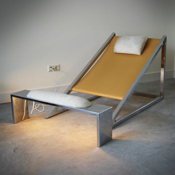 Chair and footrest. Chromed steel frame with (new) rubber sling seat. Cushions white pony. There is a light below the footrest. An example of Italian 'Radical' design. Manufatured by Poltronova, Montale, Pistoia.
Archizoom Associati (Italian,