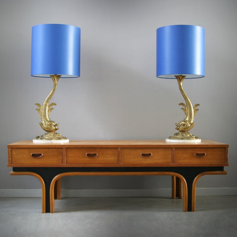 Pair of baroque table lamps from the 50s. The  lamps are made  of bronze and marble with new shades and new wire.