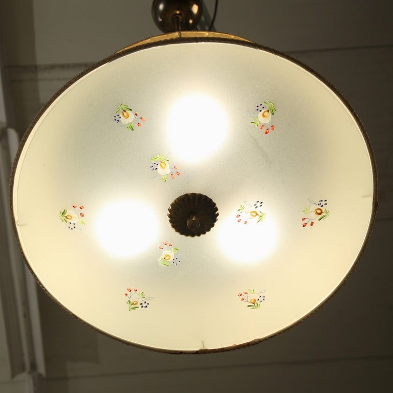 Original Lisa Johansson-Pape pendant lamp with a handpainted glass diffuser, brass stem and details. Shade is original.