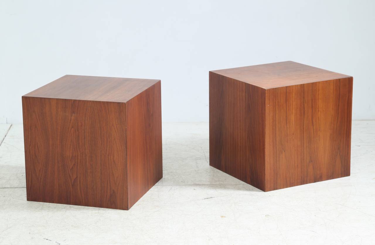 A set of four walnut cube shaped coffee tables or displays by Milo Baughman.