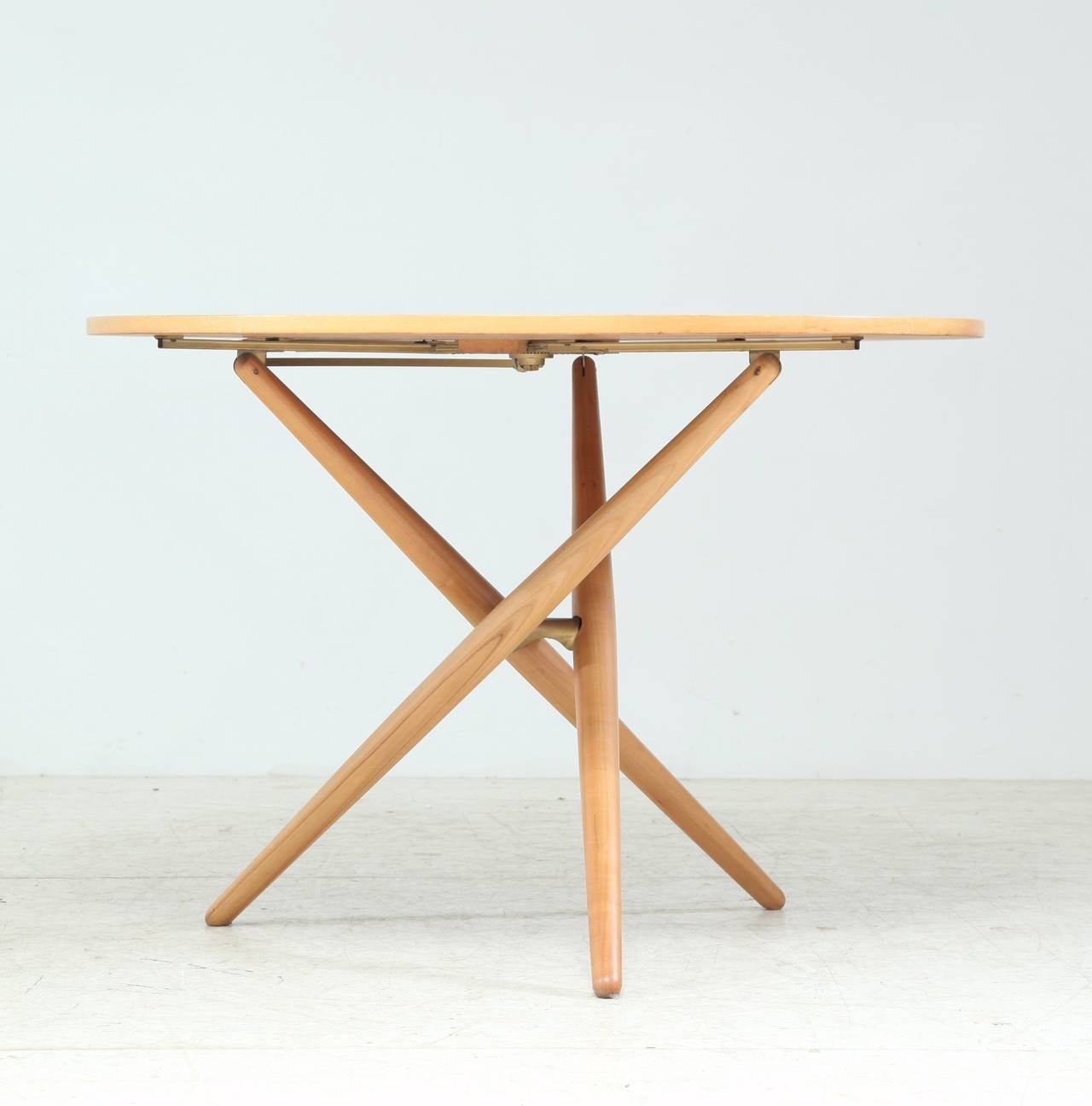 A height adjustable wooden table, designed by Jurg Bally for Wohnhilfe, Switzerland, 1951.
The name of this design was the 'Ess-Tee' (eat-tea) table; a fitting name, as the table can be placed at different heights with an ingenious mechanism, to