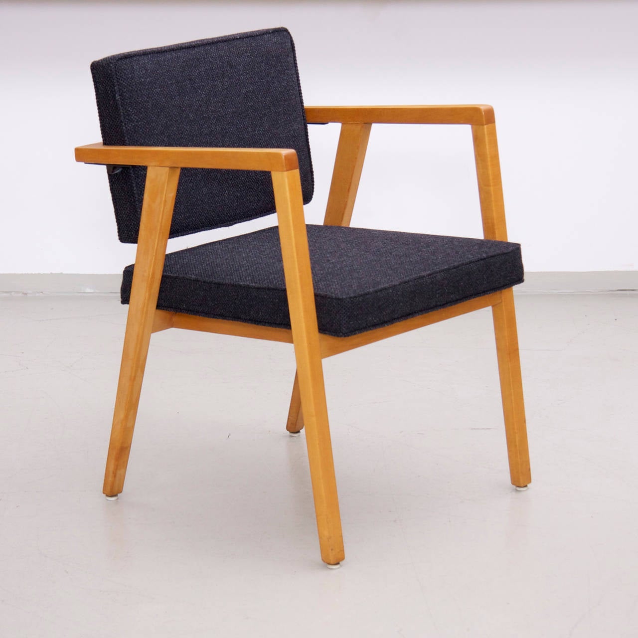 New upholstered Albini armchair in Kvadrat Skifer wool fabric.