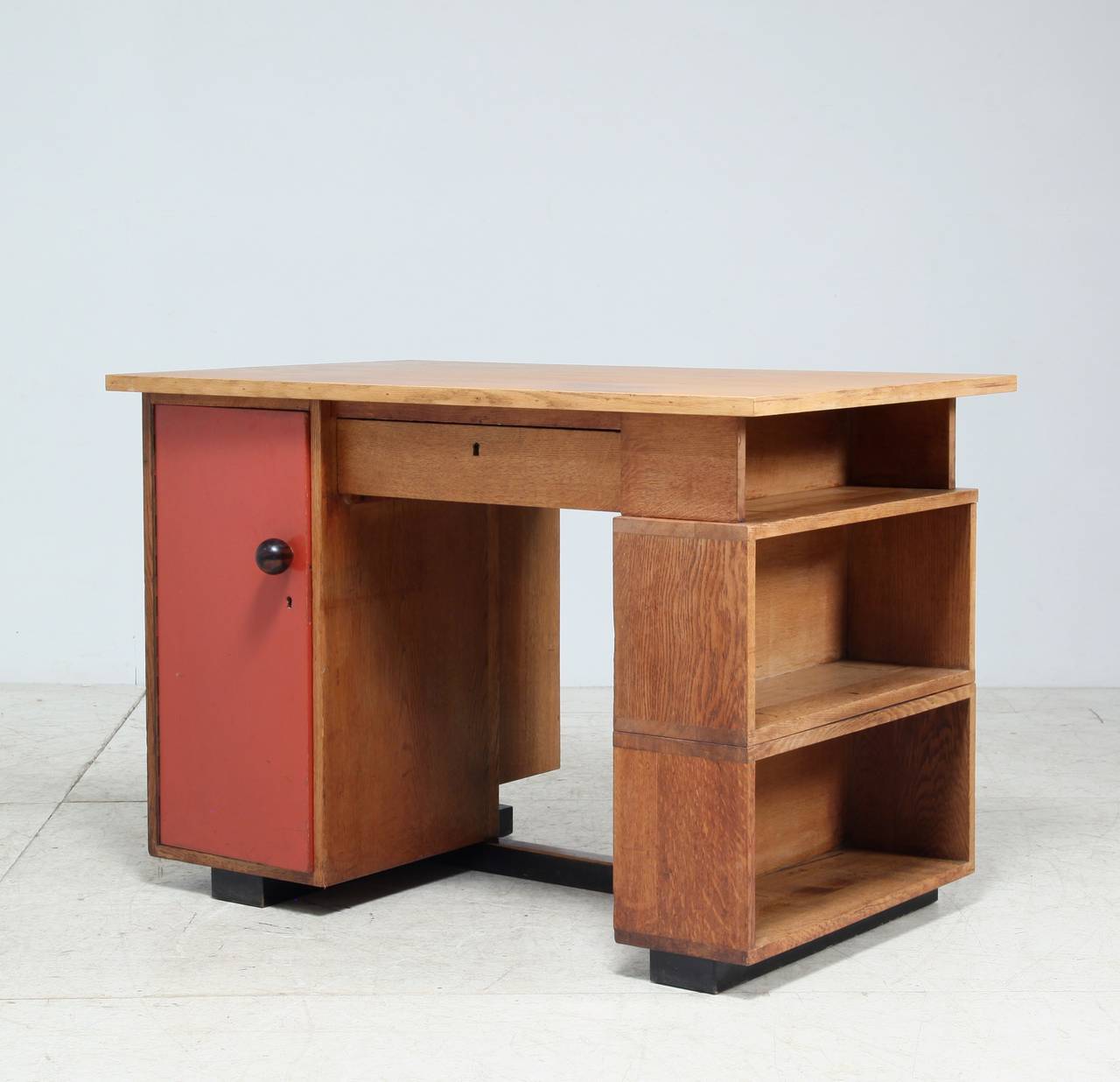 Rare and sober desk by J.A. Muntendam. This desk was especially made for a school in Utrecht (Holland). The desk originates from one of the former teachers of the school, who used it at home after the desk and accompanying bookcase became obsolete