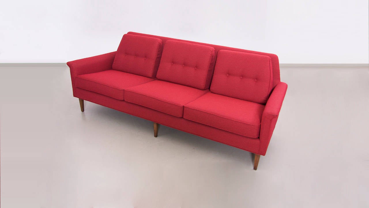 Just finished Kipp Stewart sofa in a dark red. Reupholstered with an authentic vintage US origin fabric.