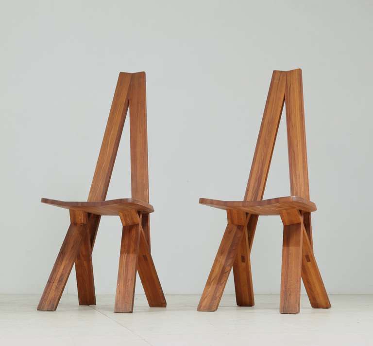 A set of two elm 'S45' chairs by Pierre Chapo, constructed according to Chapo's 'Chlacc' system. The feet are connected to the seat with Chapo's typical, visible connections.