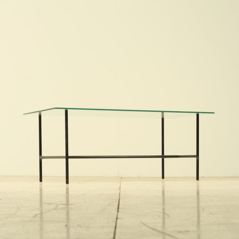 Sidetable by French designer Pierre Guariche, light and transparant table. Original old glass top is free from damages or chips, metal frame has very light patina. Excellent condition.
