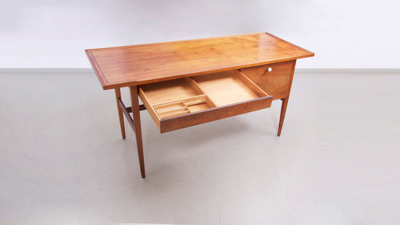 Rare desk by Kipp Stewart in excellent condition with two drawers. American walnut!
