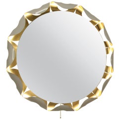Illuminating mirror with golden inlayed white metal circles