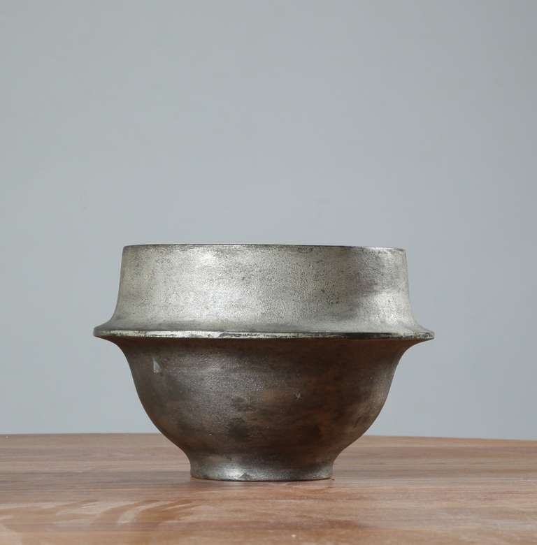 A sculptural sand cast metal bowl by Lorenzo Burchiellaro, from 1968.