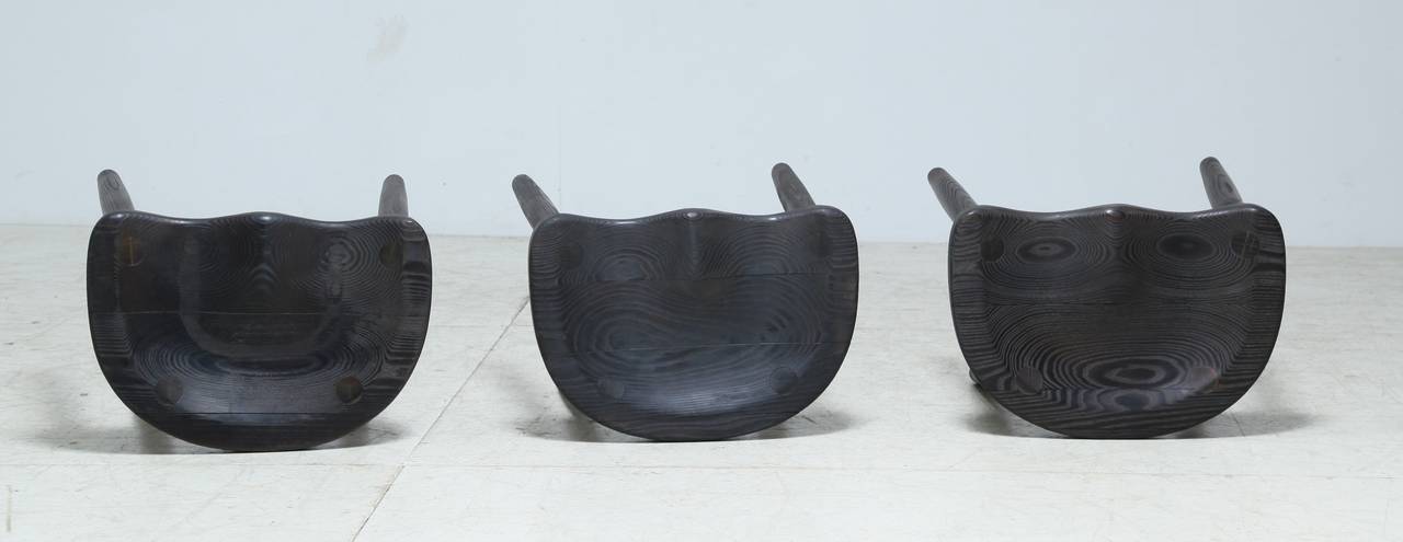 Blackened stools from a series of handcrafted wooden stools by Robert Roakes. A characteristic of Roakes' work are the expressive wood connections, Roakes is a craftsman and designer from Oxford, Maine, who has been active for over 60 years.
His