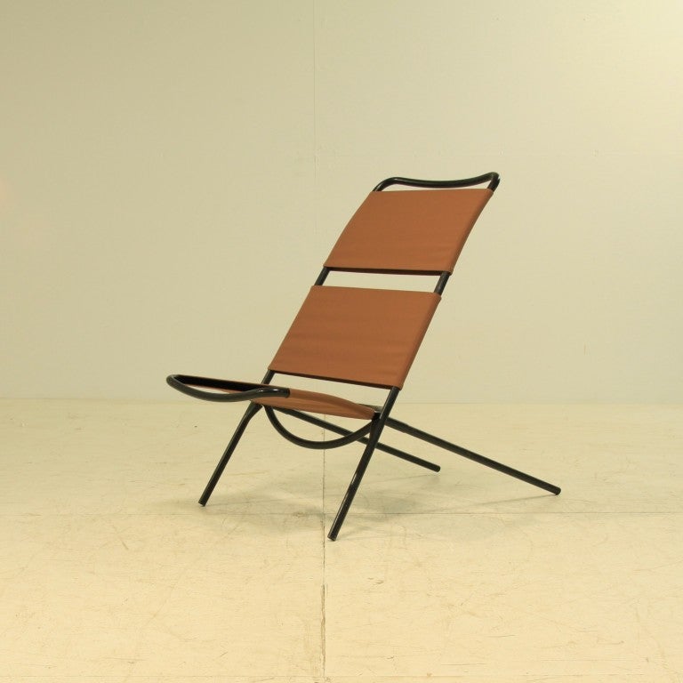 Kongo chair by Ilmari Tapiovaara for Asko, Finland, 1954. Low demontable chair of two extractable pieces of black enameled iron tubing with new brown and grey waterproof cotton canvas bends. Both colours available in pairs. Suitable for outdoor use.