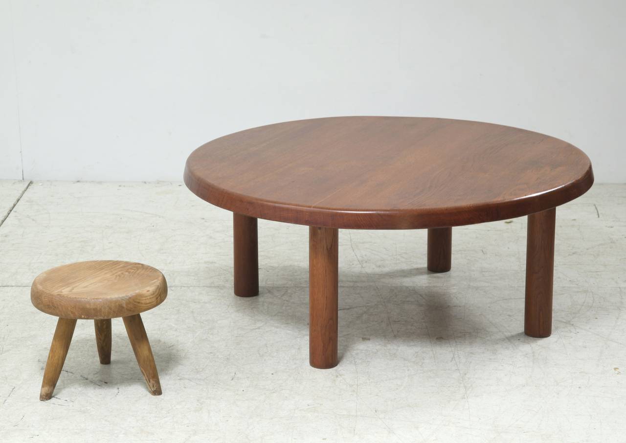 A stunning and rare, low oak coffee table by Charlotte Perriand.