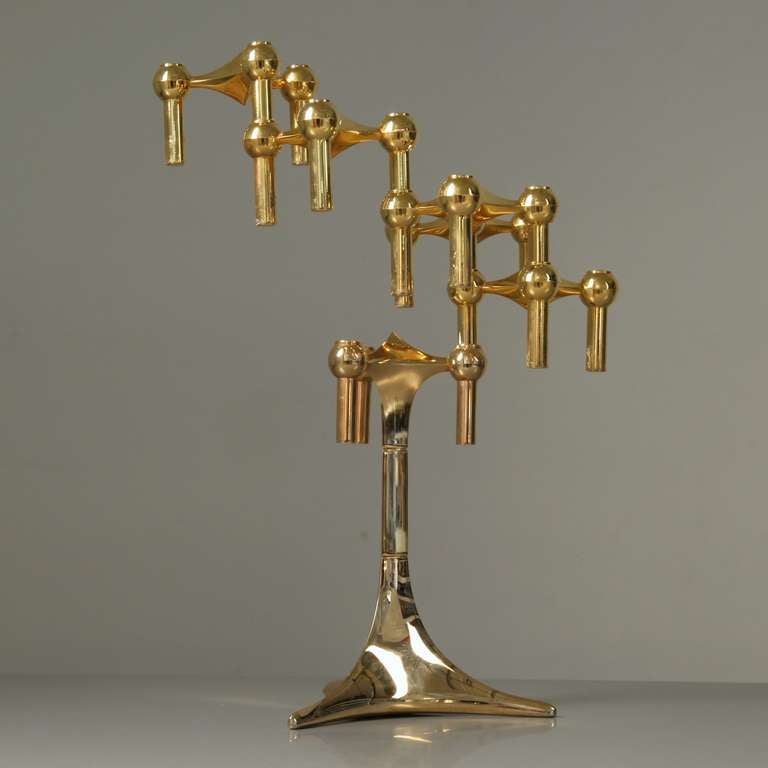 Rare gold coated edition of this iconic piece by Ceasar Stoffi for Fritz Nagel. Tall base with six candleholders. Each one holds three candles and can be positioned on the base and to eachother  as per your own creation.

* This piece is offered to