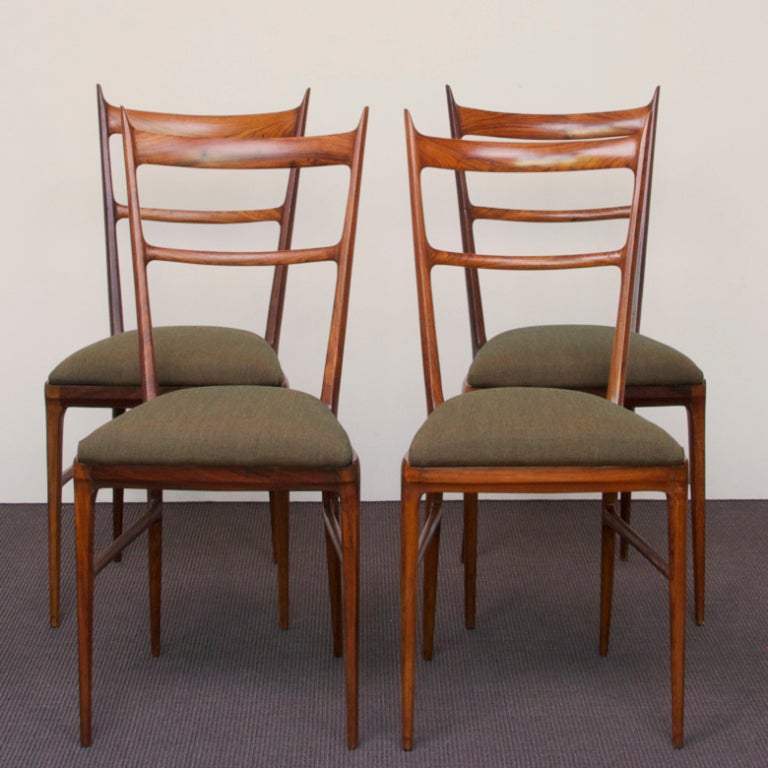 Set of 4 fully restored Carlo de Carli Dining Chairs in Rosewood and covered in new Kvadrat Remix Fabric.