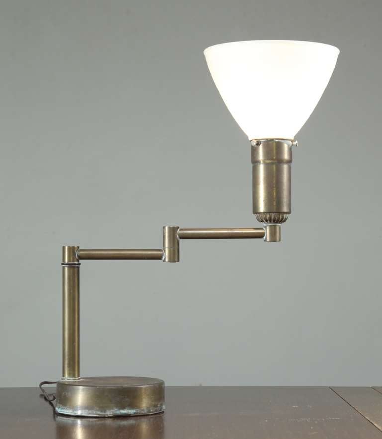 Mid-Century Modern A Walter Von Nessen Swing-Arm Table Lamp in Brass. American, 1950s For Sale