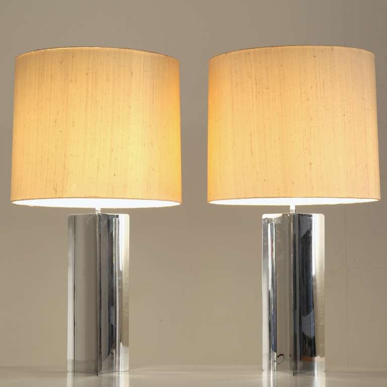 Set of large table lamps with curved chrome panels and original shades.
Perfect condition.
