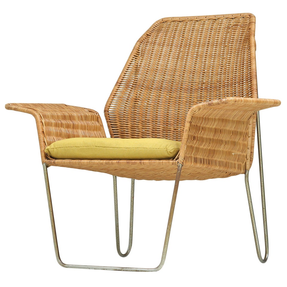 Dutch Design rattan armchair on a bent iron frame, 1960s For Sale