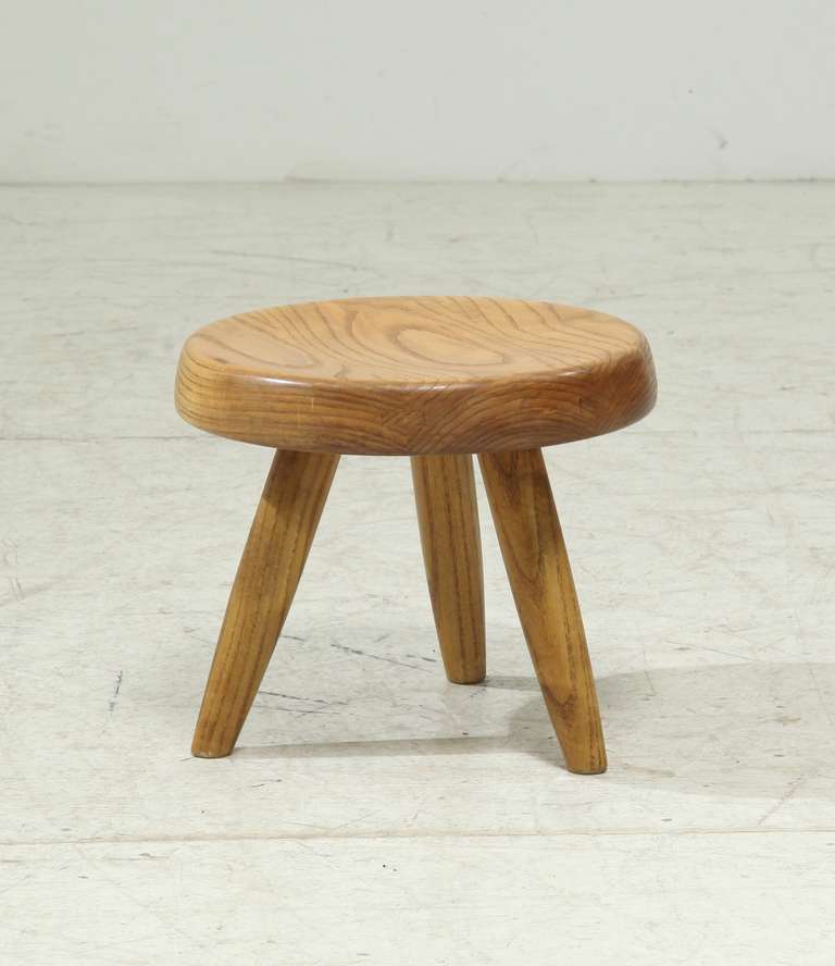 A low stool in oak by Charlotte Perriand and in a wonderful condition.

Charlotte Perriand originally designed these low stools in the early 1950s to use in projects like her own apartment in Paris. Later she used them in various