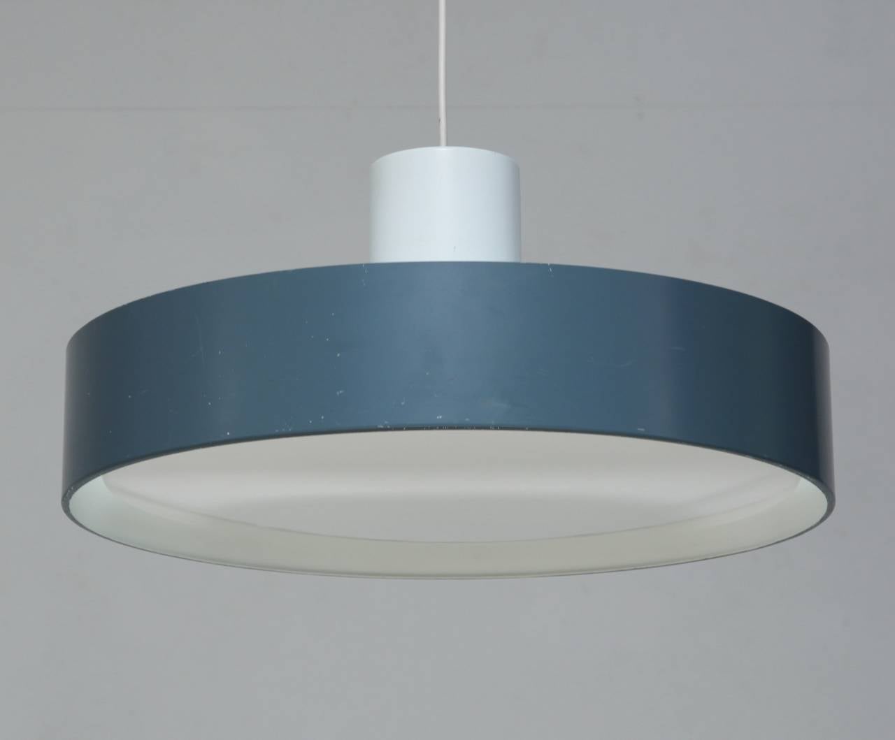 A large 'Blågård' petrol blue pendant lamp by Karen & Ebbe Clemmensen and Jørgen Bo for Fog & Mørup, Denmark. The pendant is made of metal with an acrylic diffuser.
The lamp is in a good condition and marked by Fog & Mørup.