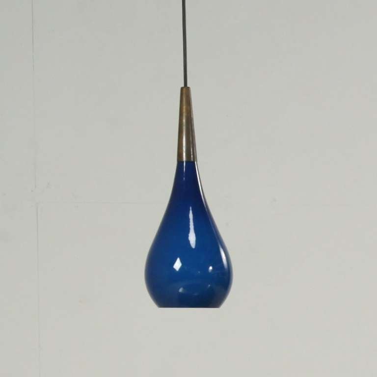 Sapphire blue drop shaped lamp with opaline inside and rare brass top. Total drop can be adjusted to your requirements.