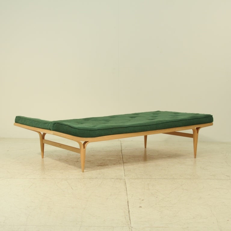 Large T303 daybed by Bruno Mathsson designed in 1957, known as the Berlin daybed as it was first shown in the International Building Exhibition in Berlin. Signed,  Firma Karl Mathsson, 1969. 
Birch base with wonderful green upholstery and leather