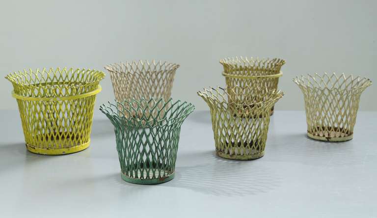 Set of 6 planter pots by Mathieu Mategot.
All similar in sizes and a wonderful  pale pastel color setting.