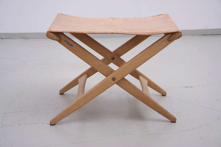 Luxus Vittsjö folding stool in original vintage condition with natural leather cover on solid oak