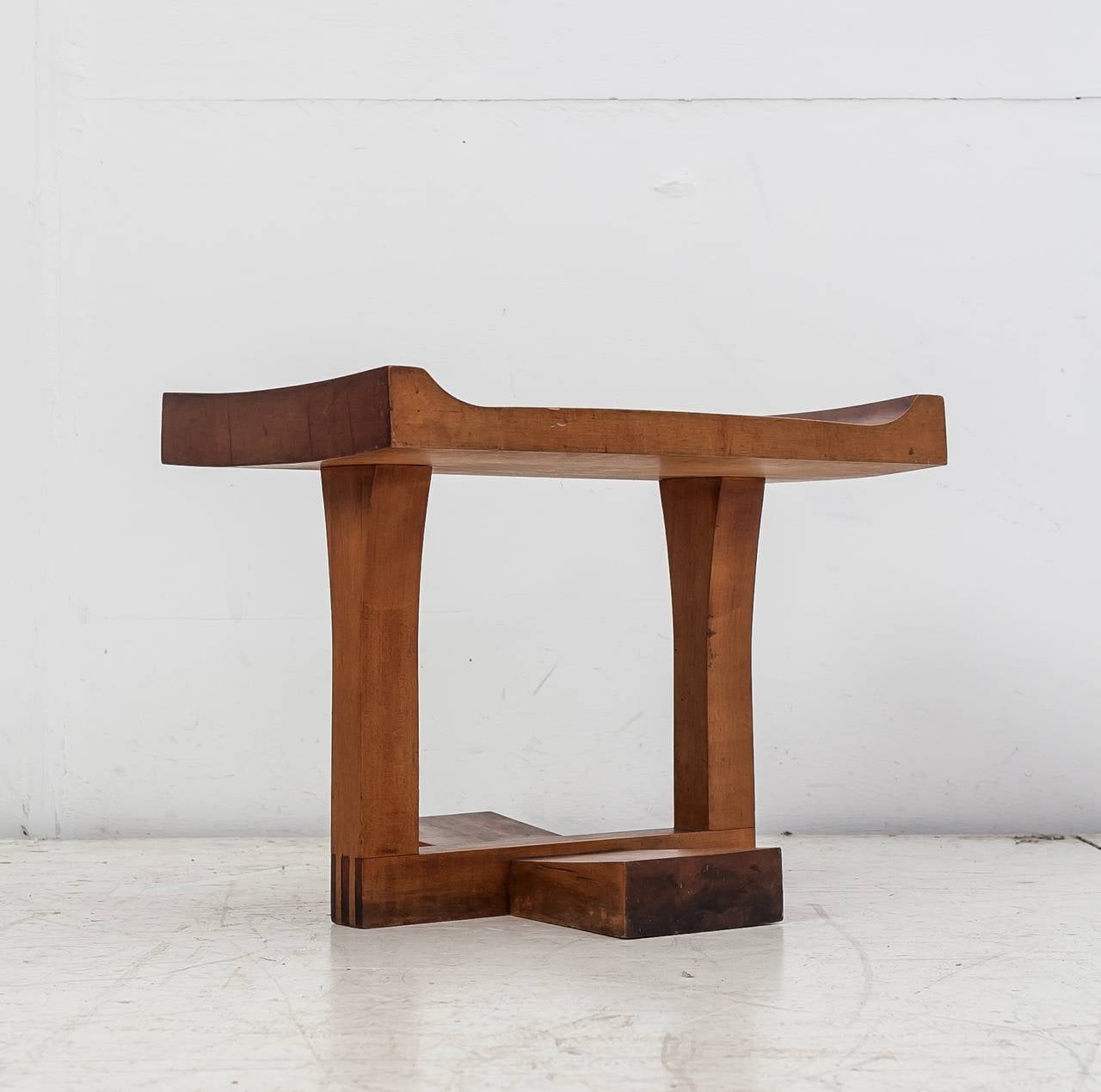 An American studio crafted cherry wood bench, stool or coffee table.
It is an exceptional artistic piece, very well made with beautiful connections in the seating and a wonderful patina.
We have not yet identified the maker of this wonderful