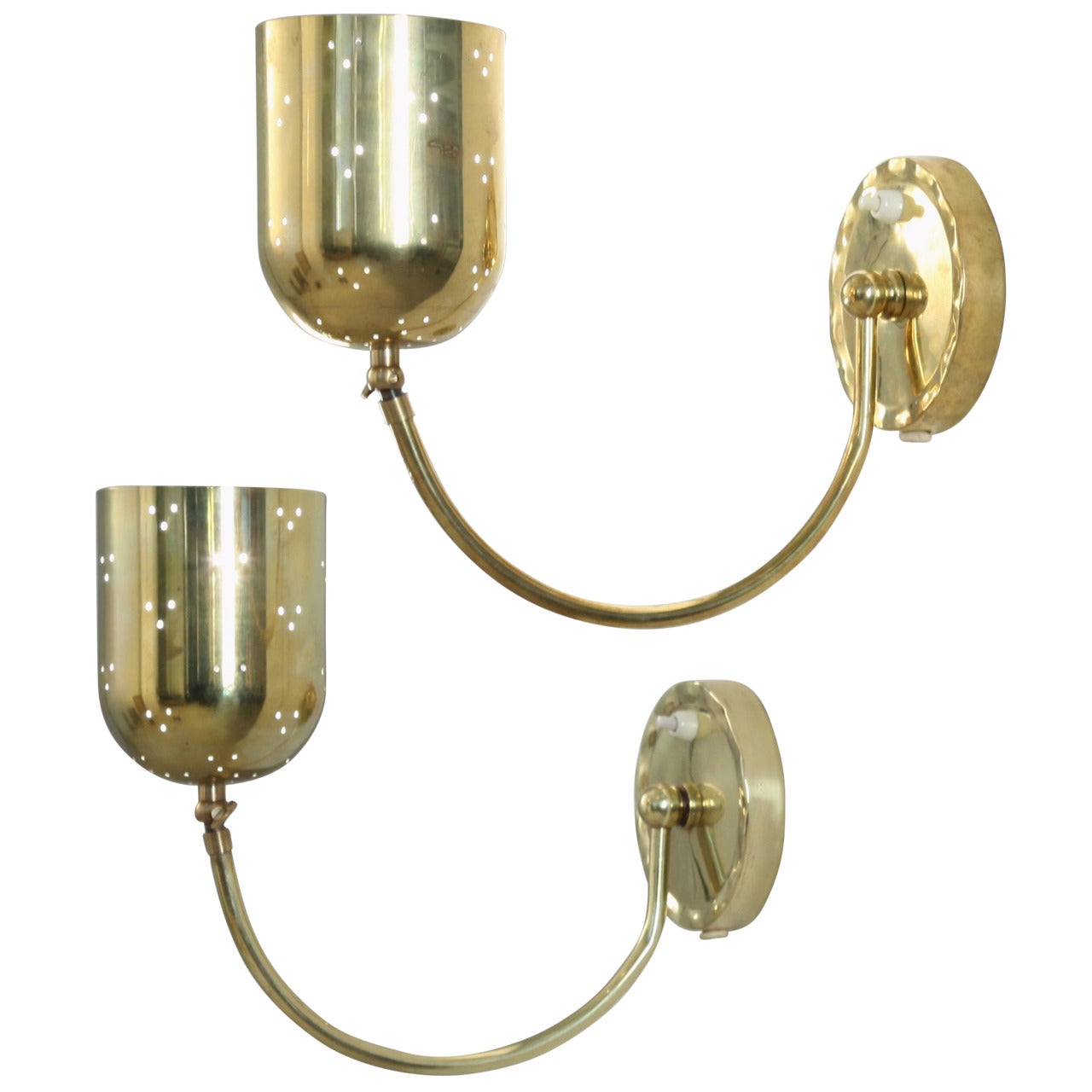 Pair pivoting Idman brass wall appliqiques, manner of Tynell, Finland, 1950s For Sale