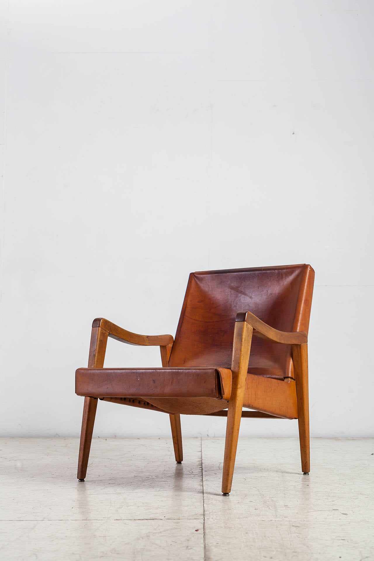 American Maple Leather Lounge Chair with a Beautiful Patina For Sale