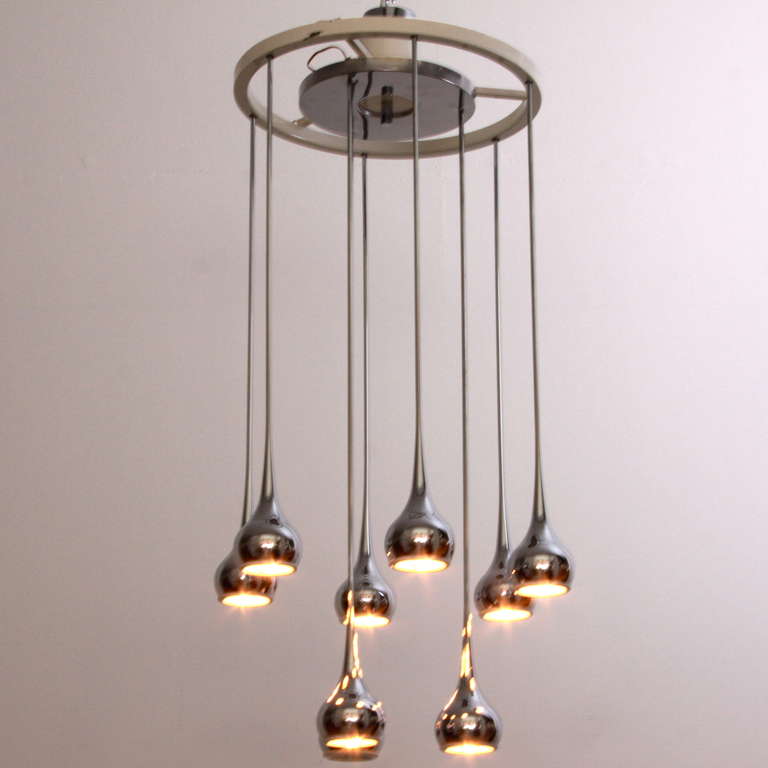 Original large vintage chandelier for legendary Italian lighting company Esperia. Nine beautiful and stylish chrome drop shapes hanging from a metal suspension ring. Very elegant. With original label!
