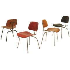 Set of four Evans editions of the Eames DCM chair