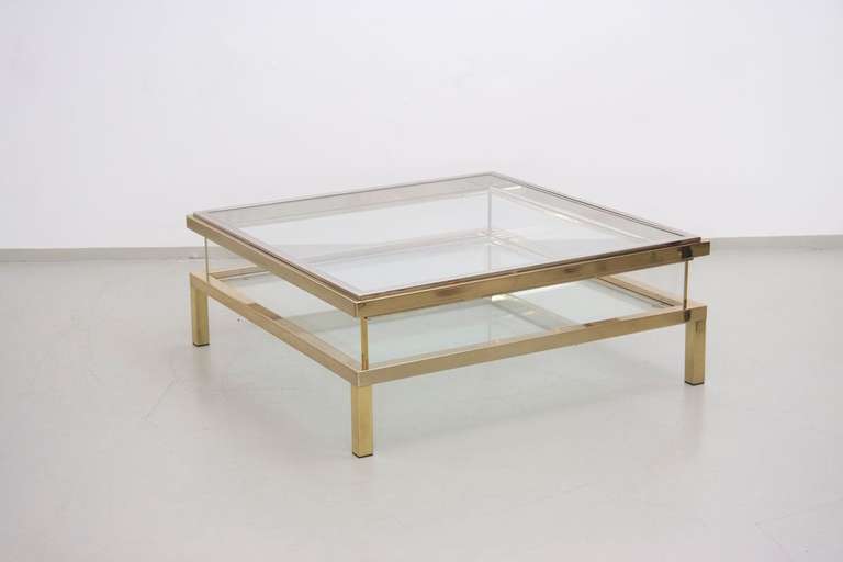 Large square glass table with sliding top by Maison Jansen.