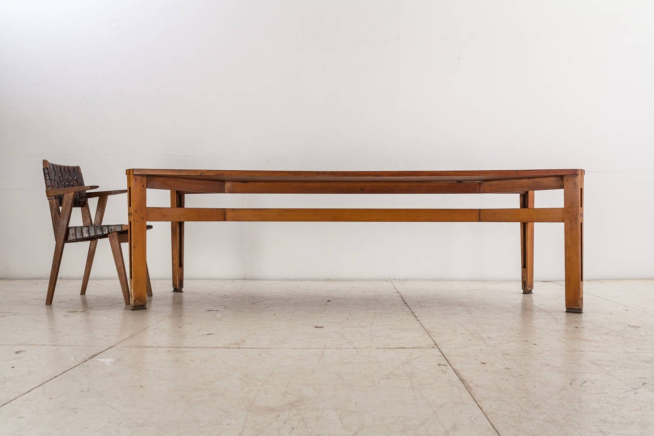 A large, rectangular table in wood by Ico Parisi in a wonderful raw patina.