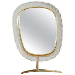 Pivoting brass Vanity mirror