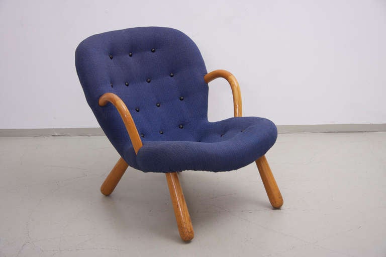 For sale is the Muslinger Stole / Clam chair by danish designer Philip Arctander
designed in 1943, covered in wool fabric with leather buttons, beechwood frame. This chair is formerly known as the Martin Olsen chair.