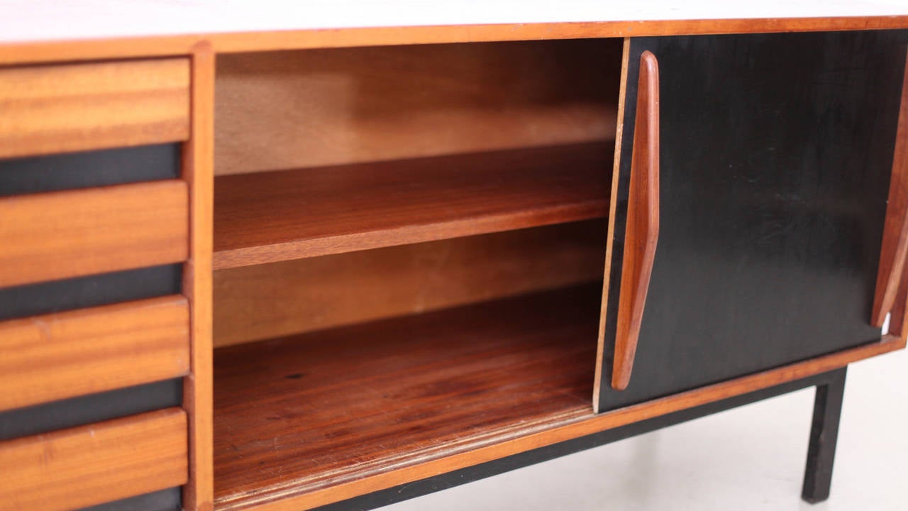 Charlotte Perriand Cansado sideboard in mahogany. Produced in France circa 1958 by Steph Simon.
From Guinea, Islamic Republic of Mauritania, Mali, Africa.