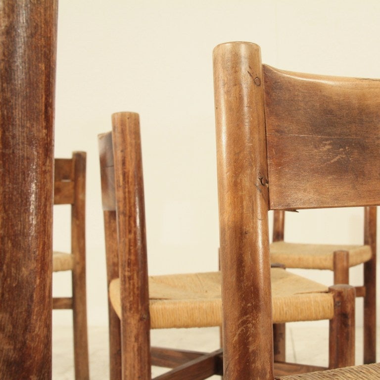 Mid-Century Modern Charlotte Perriand set of 8 oak Courchevel dining chairs, France, 1940s For Sale