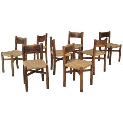 Charlotte Perriand set of 8 oak Courchevel dining chairs, France, 1940s
