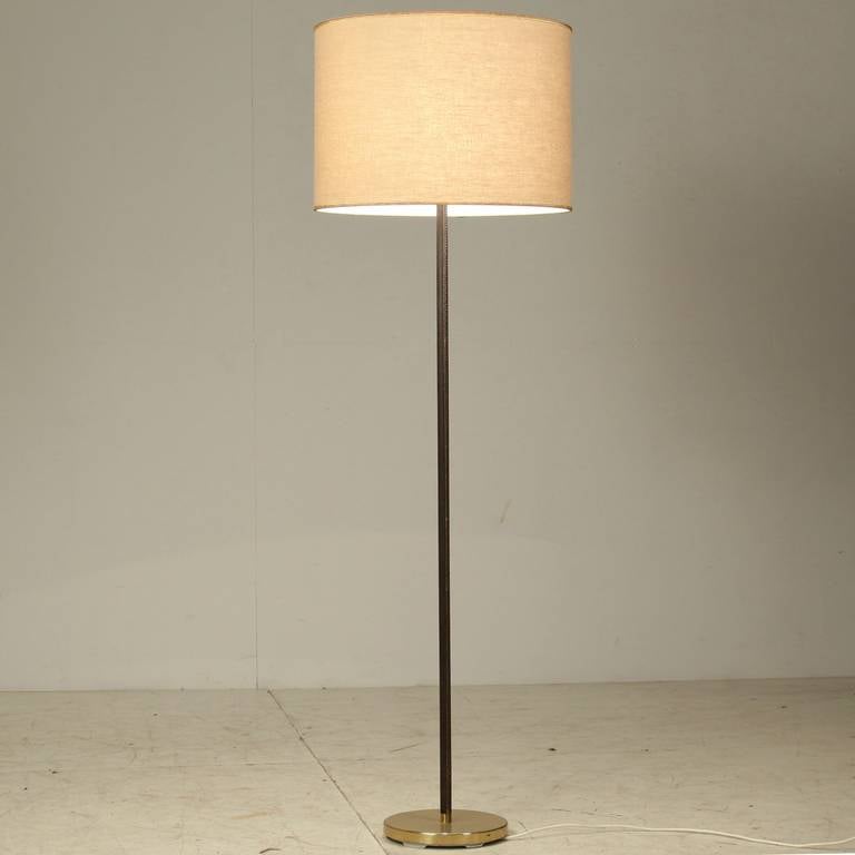Pair Minimal Floor Lamps With Leather Stem And Cream Shade Kalmar Pair Of Kalmar Floor Lamps With Leather Around The Stem And A Heavy Metal Base
