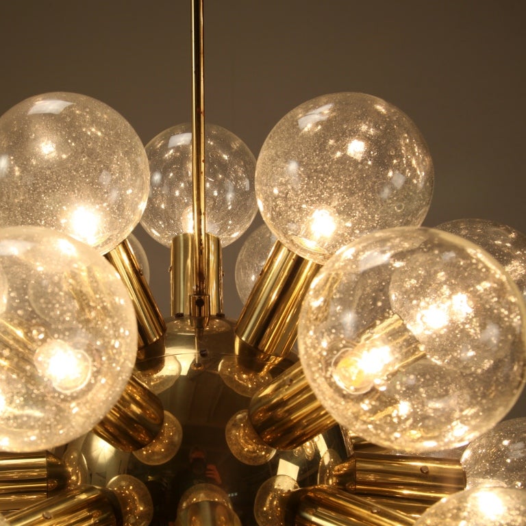 Several Robert Haussmann Brass Sputnik Pendants Holding Twenty Eight Bulbs In Excellent Condition For Sale In Maastricht, NL