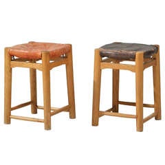 Pair 1950s oak stools with leather seatpad