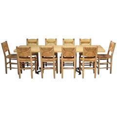 Large Charlotte Perriand Les Arcs table with 10 bauche chairs