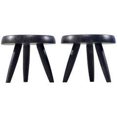 Pair black Charlotte Perriand low stools