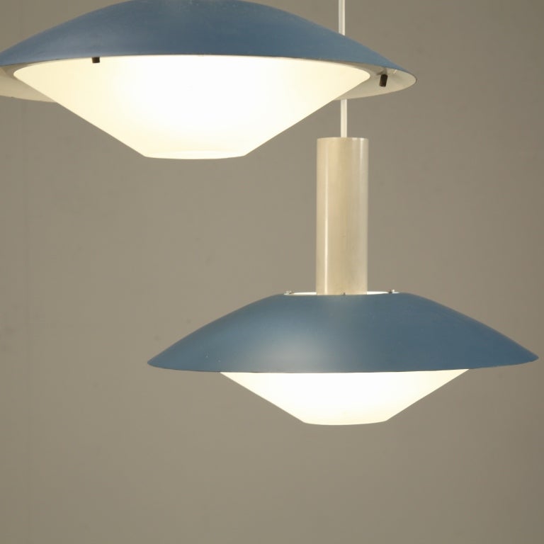 Set of three blue shaded saucer lamps