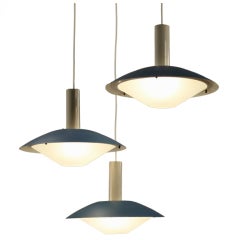 Set of three blue shaded saucer lamps